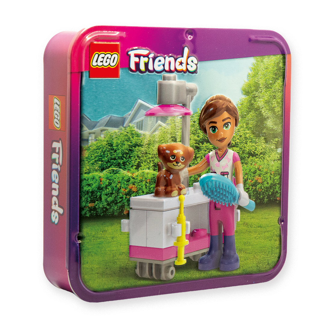 LEGO Friends Spielzeugdose mit Figur beim Pflegen eines Haustiers an einer mobilen Tierpflege-Station im Garten.