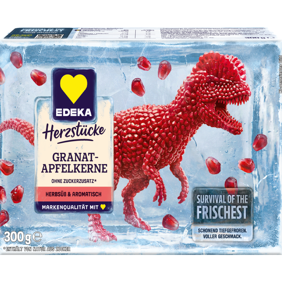Die Abbildung zeigt die Verpackung der EDEKA Herzstücke Granatapfelkerne. Die Granatapfelkerne bilden dabei die Form eines Dilophosaurus.