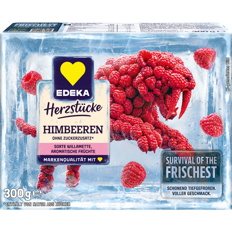 Die Abbildung zeigt die Verpackung der EDEKA Herzstücke Himbeeren. Die Himbeeren bilden dabei die Form eines Säbelzahntiegers.