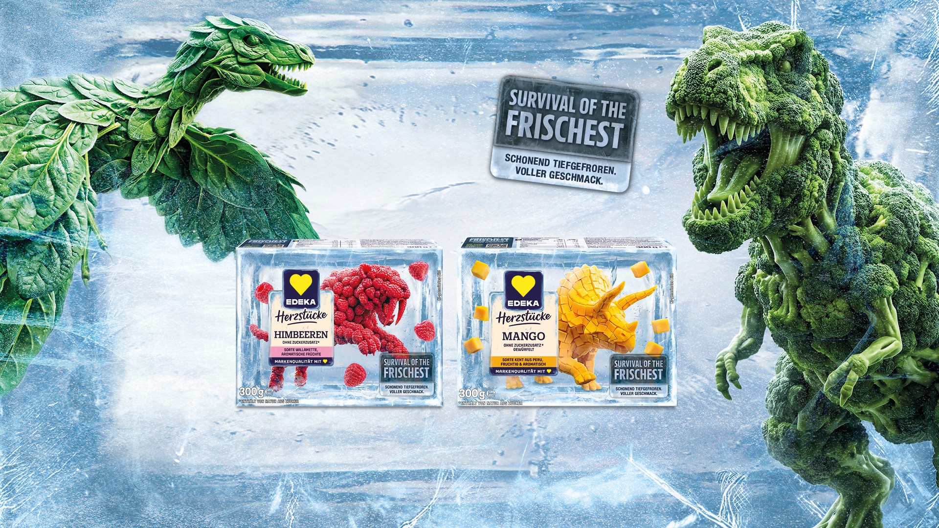 Motiv mit EDEKA Herzstücke gefrorenen Himbeeren und Mangostücken in Eisblöcken, flankiert von Dinosauriern aus Blattgemüse und Brokkoli.
