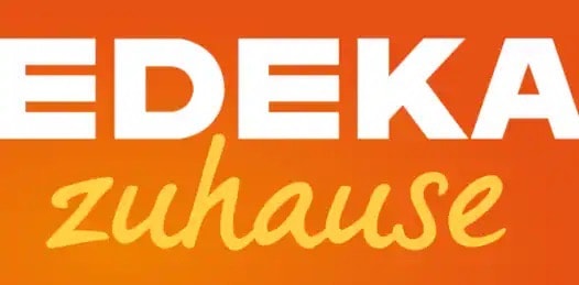 Logo von EDEKA zuhause. Weiße und gelbe Schrift auf orangenem Hintergrund.