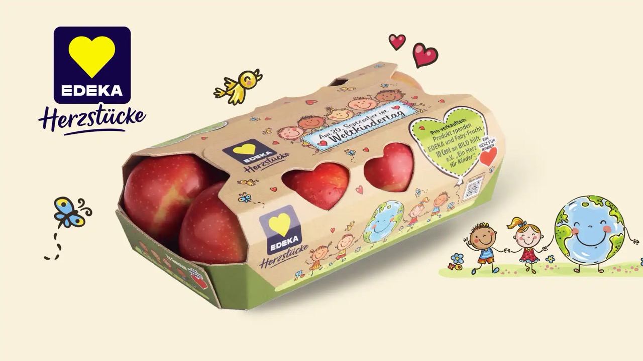 Eine Pappschachtel für acht Äpfel. Auf der Packung ist Werbung für den Weltkindertag.