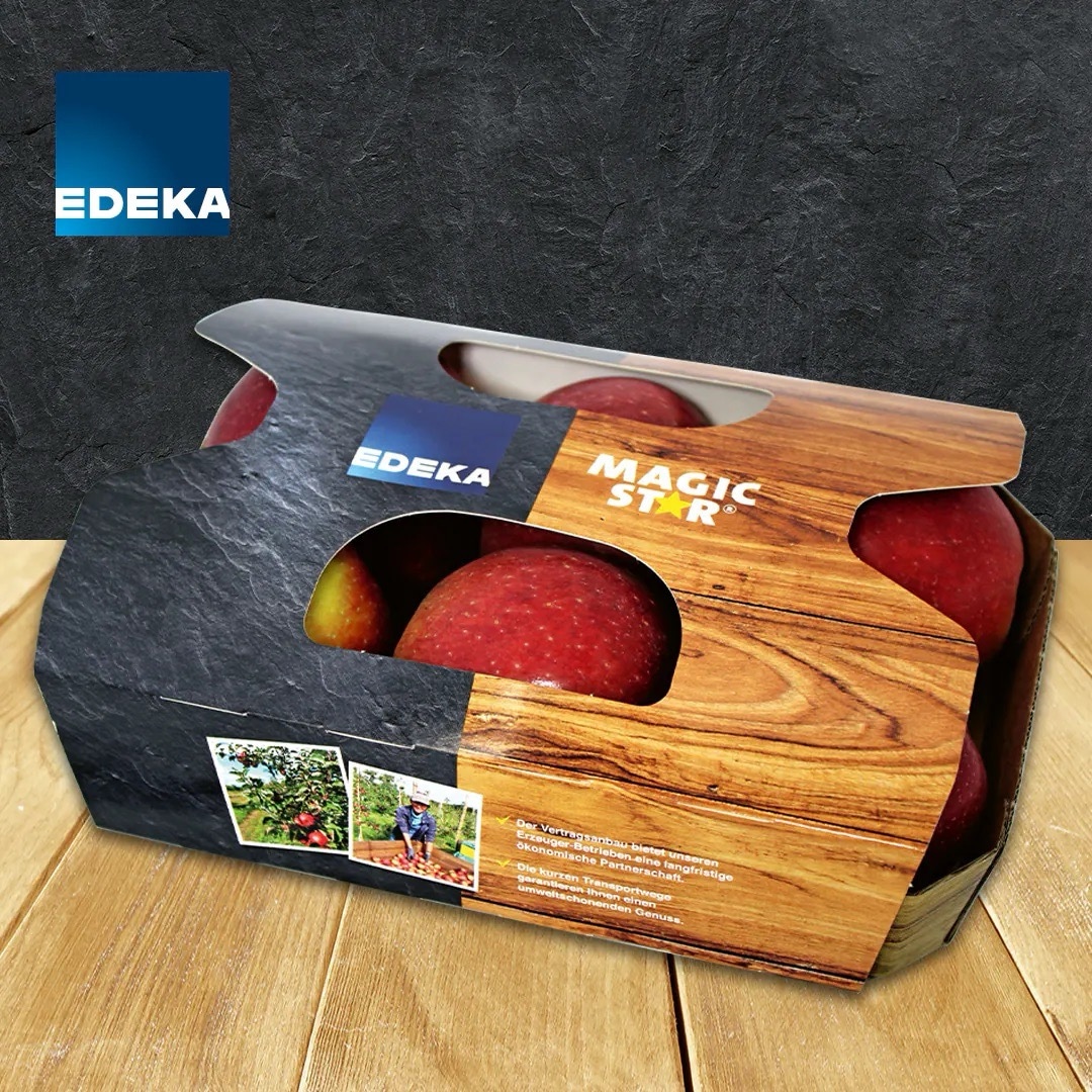 Pappschachtel mit sechs Äpfeln und dem Logo EDEKA MAGIC STAR.