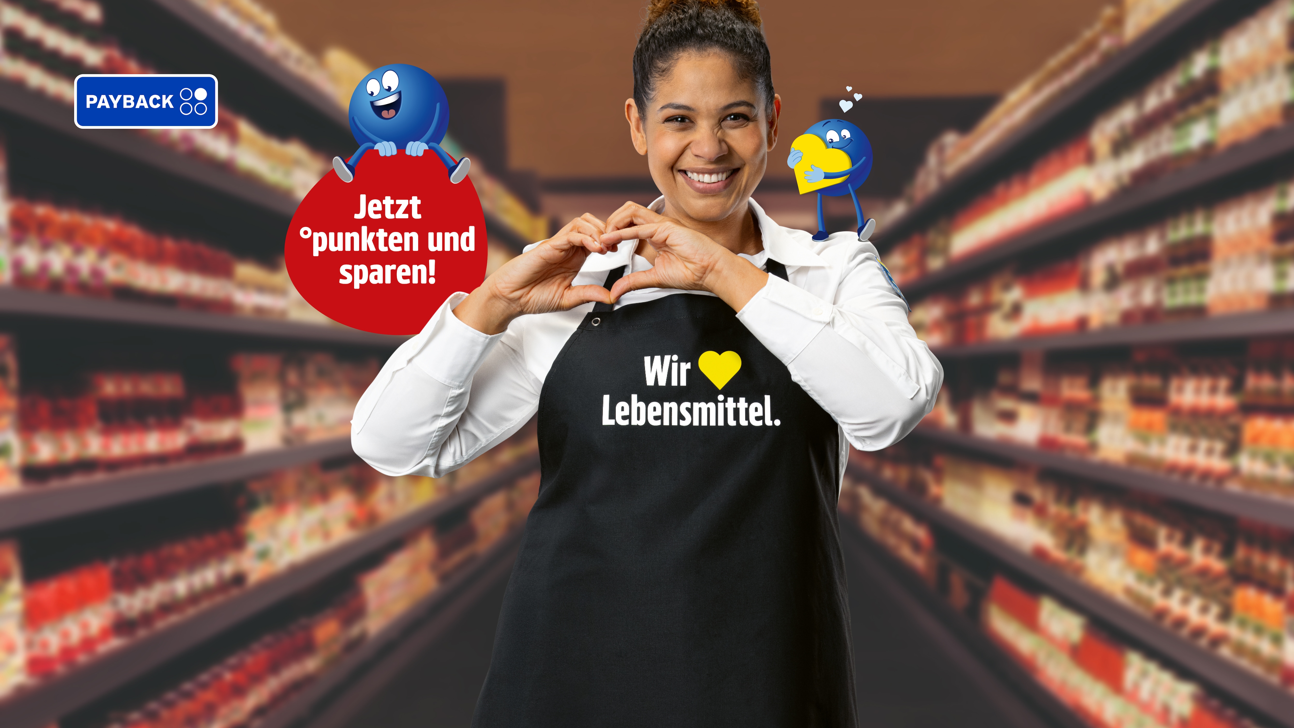Person im Supermarkt macht mit den Händen ein Herz; PAYBACK‑Werbung mit „Jetzt punkten und sparen!“ und „Wir ♥ Lebensmittel.“