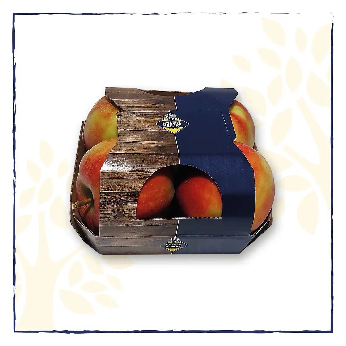 Vier rote Äpfel in einer braun-blauen Verpackung aus Pappe. Auf der Packung steht unsere Heimat.