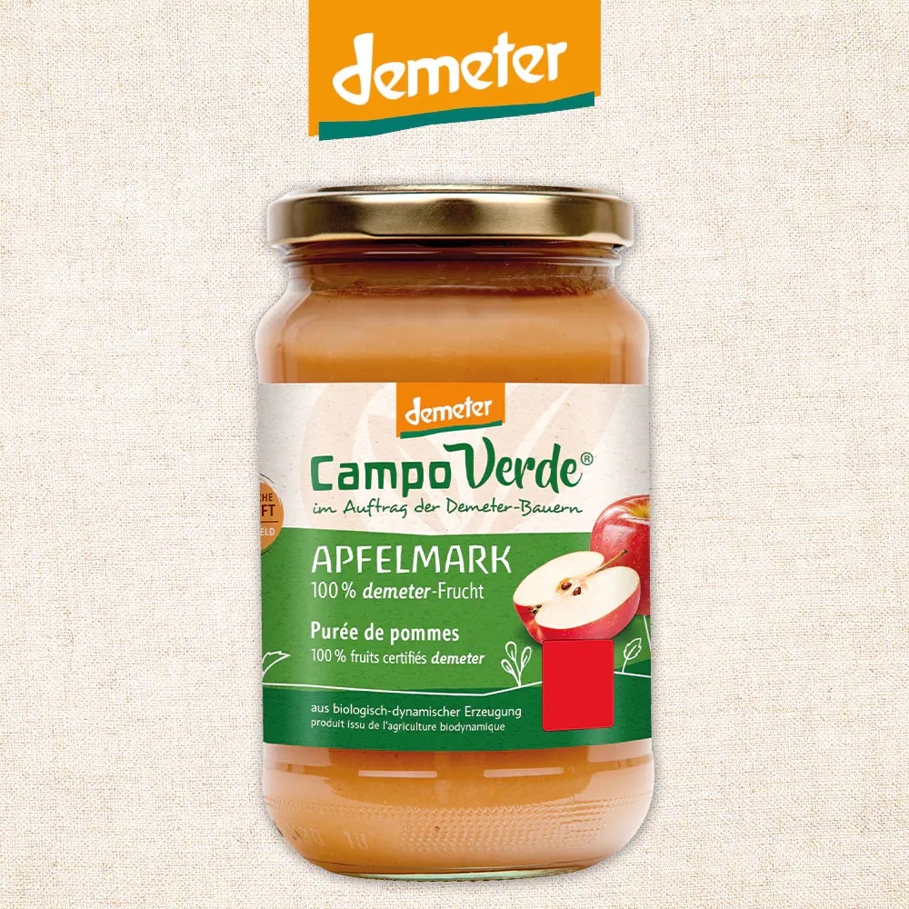 Ein Glas mit Schraubverschluss und Etikett: Campo Verde Apfelmark.