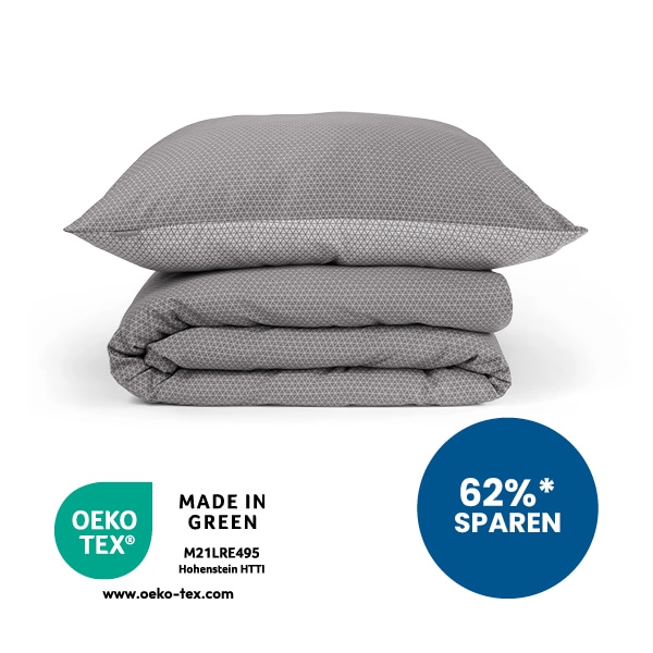 Kissen und Decke in anthrazit-silber gestapelt aufeinander. 62% sparen Störer