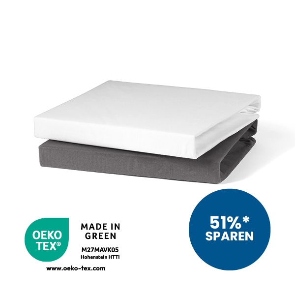 Spannbettlaken in weiß und anthrazit gestapelt aufeinander. 51% sparen Störer