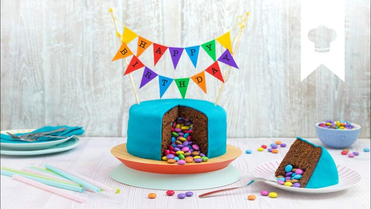 Piñata-Cake YouTube Platzhalterbild für ein Video mit dem Titel 'Piñata-Cake'.