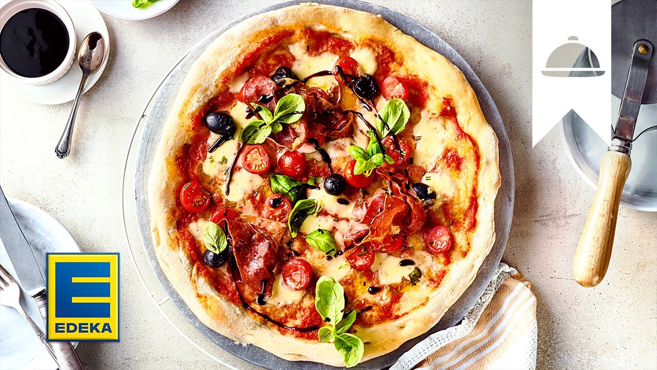 Pizza selber machen und den Teig nach Lust und Laune belegen